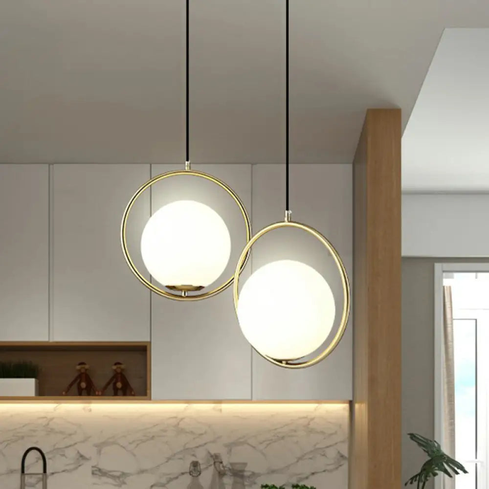 Globe Milky Glass 1-Bulb Pendant Light with Brass Loop – Modern Dining Room Suspension Lamp