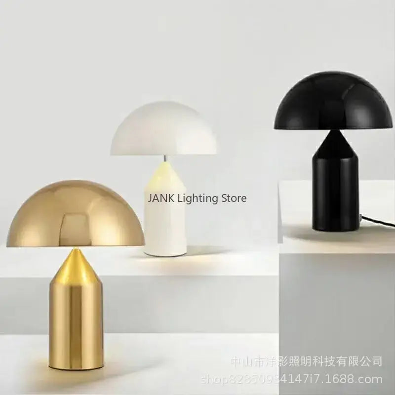 Glossy black and gold metal mushroom table lamp with sleek metallic base perfect for decorbites Atollo bedroom table