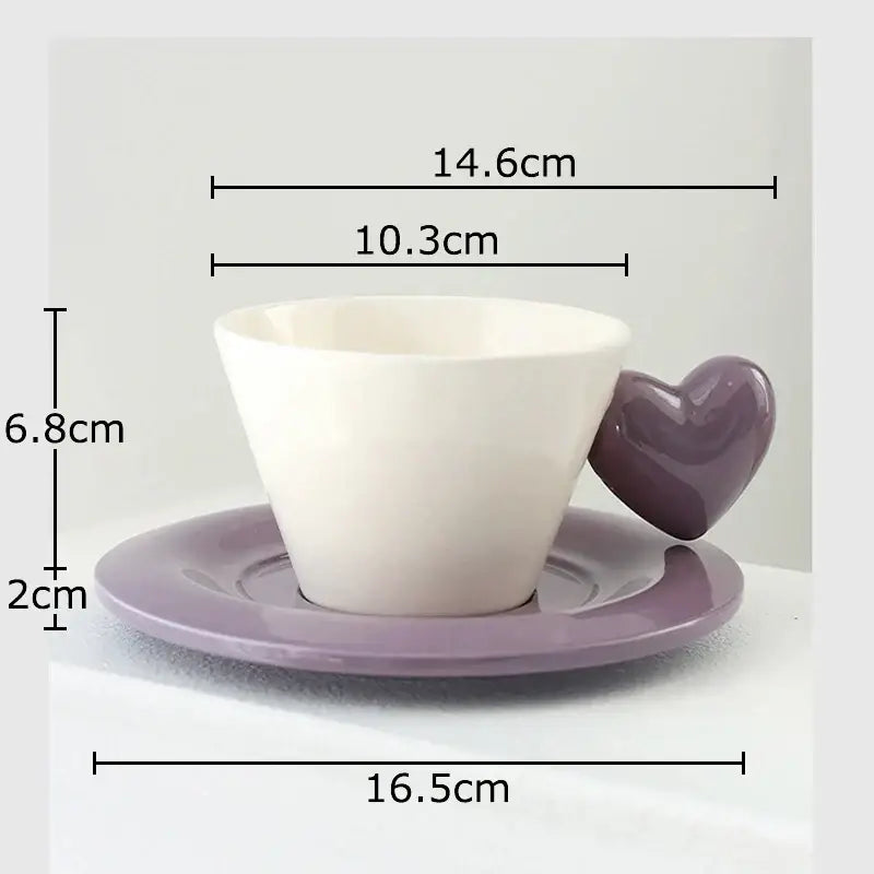White ceramic porcelain lovers mug with glossy purple heart shape handle on lavender saucer from lovers mug set