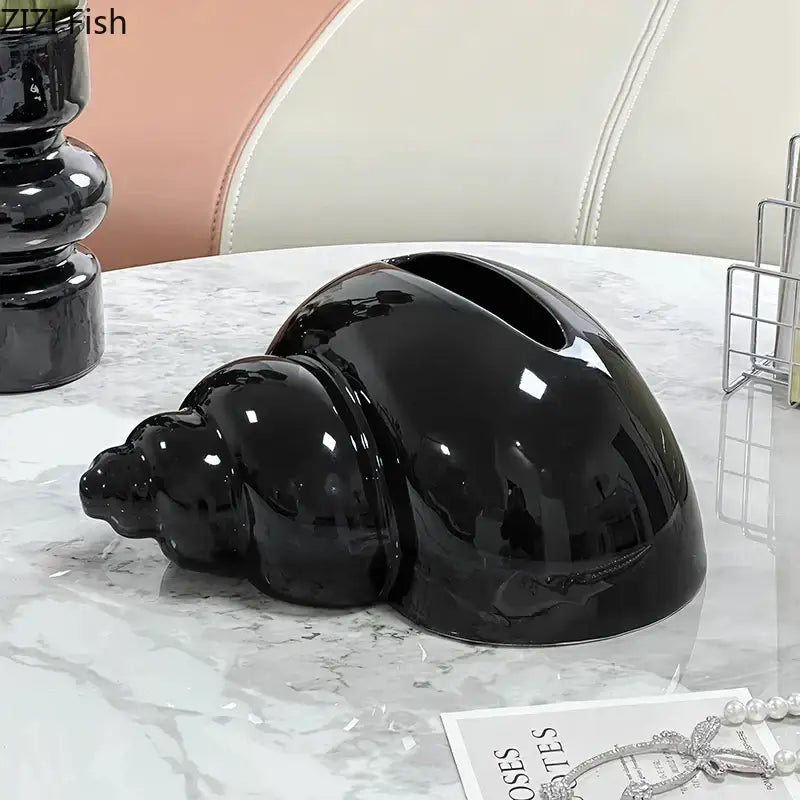 Glossy black shiny ceramic seashell vase complementing decorbites conch ceramic tissue box for living room decor