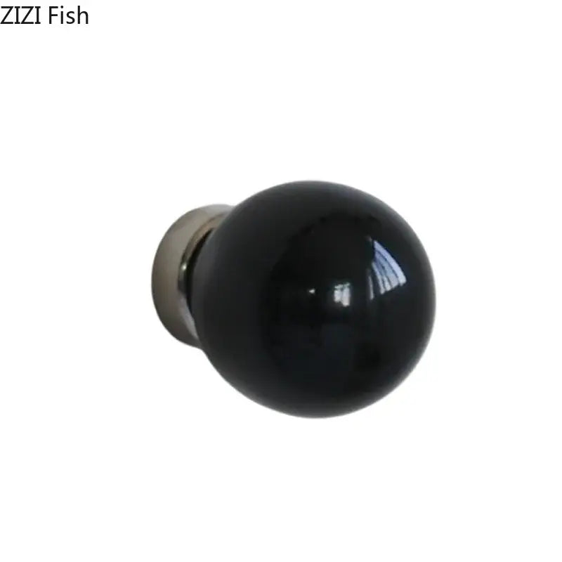 Glossy black ceramic wall hook clothing rack with spherical knob and metallic base for bedroom use
