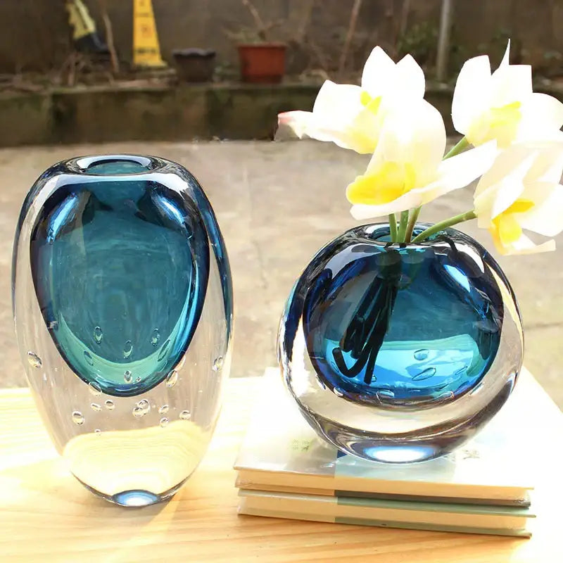 Two translucent blue decorbites crystal glass vases with a glossy finish for living room flower pot decor