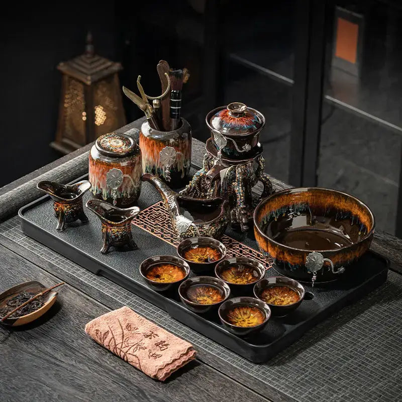 Glossy earth tone ceramic magnetic rotating tea set with intricate glaze and dark brown base decorbites dragon teapot