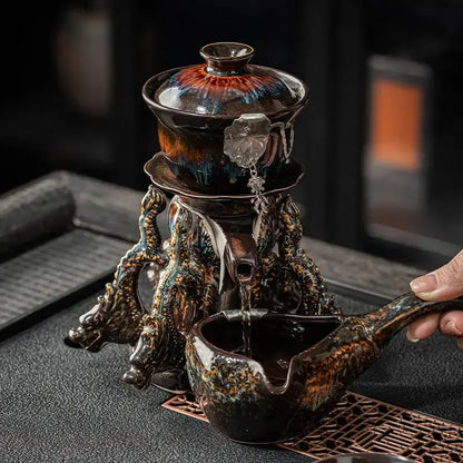 Glossy earth tone ceramic magnetic rotating tea set with iridescent glaze and dragon-shaped base decorbites dragon teapot