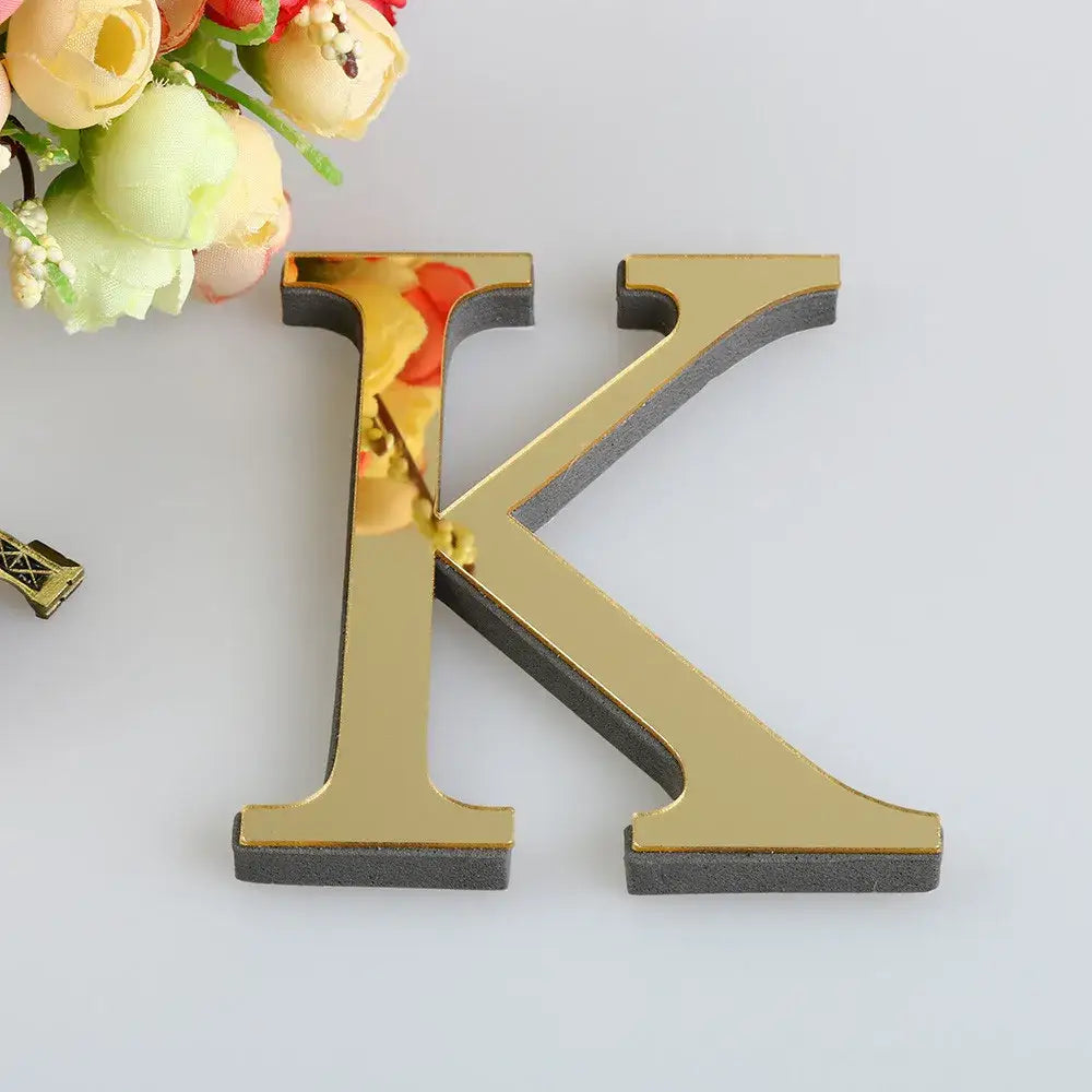 Glossy gold decorbites 3d mirror alphabet letter k with wooden finish and dark gray backing for living room wall decor