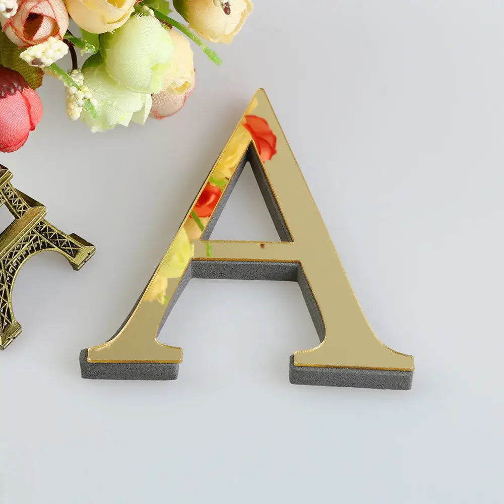 Glossy gold decorbites 3d mirror alphabet letters with wooden mirrored surface and gray base for living room wall decor