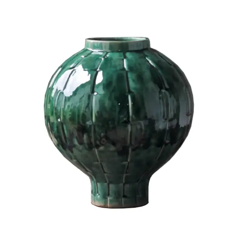 Glossy green ceramic spherical vase with a segmented lantern-like design for living room ribbed decor