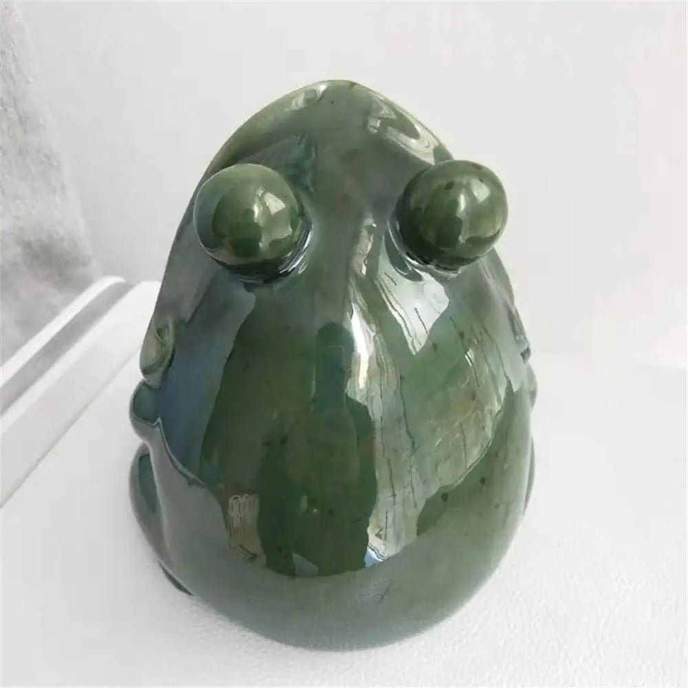 Glossy green decorbites ceramic animal frog figurine with smooth surface and rounded eyes for ceramic animal storage