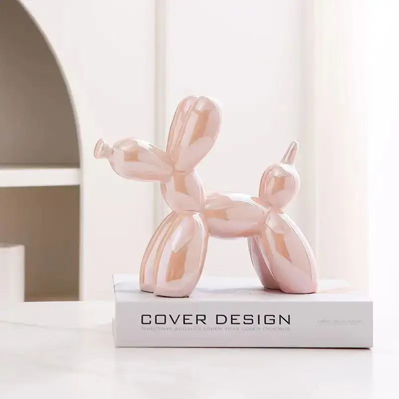 Glossy rose gold balloon dog ceramic figurine with a sleek modern design perfect as a 22cm balloon dog decor