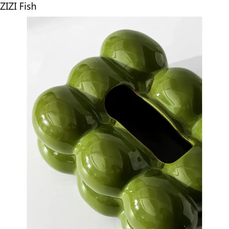 Olive-green ceramic money box shaped like grape cluster with glossy finish and coin slot for dining table decorbites cotton candy decor