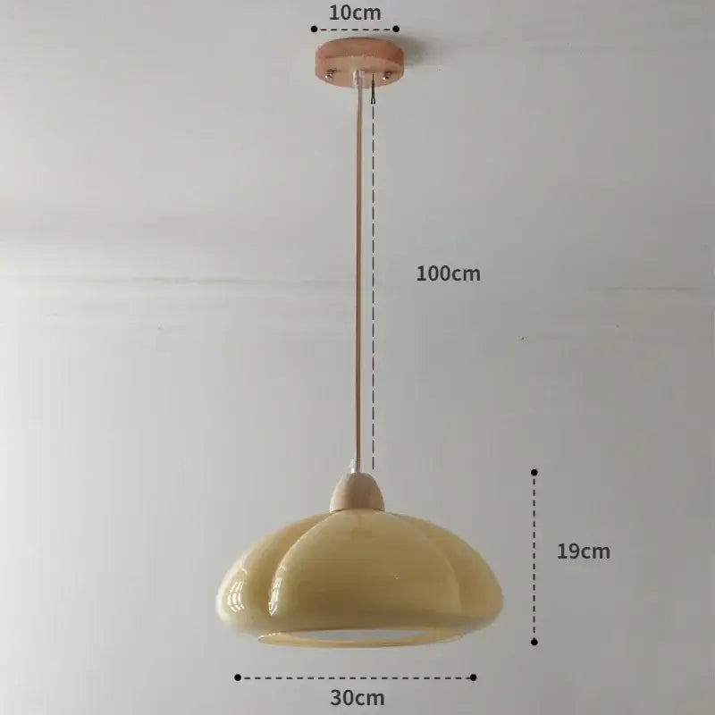 Beige ceramic pendant light with fluted dome shade and wooden mount ideal for bedroom lighting or restaurant balcony