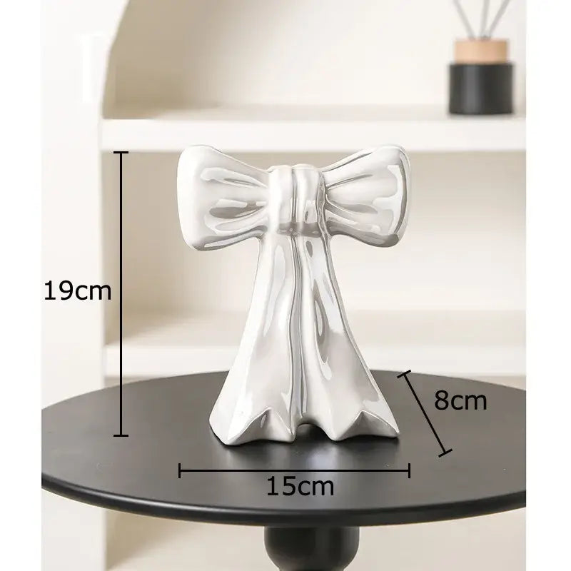 Shiny silver ceramic bow-shaped decorative figurine complementing decorbites bowknot ceramic vase floral decor