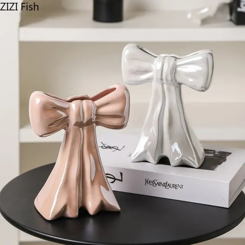 Two glossy ceramic bowknot vases in blush pink and white for bedroom decor by decorbites bowknot ceramic