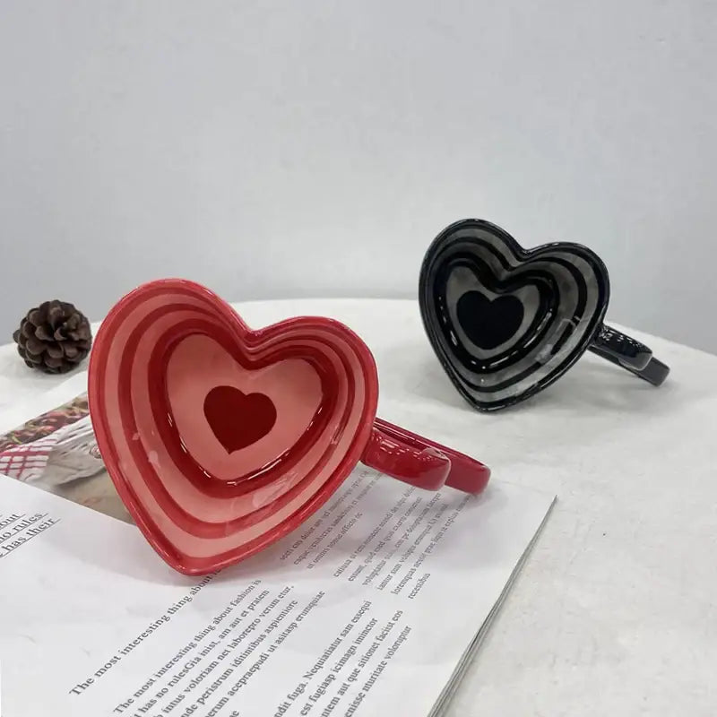 Glossy red heart shape ceramic coffee mug with concentric rings and handle perfect as decorbites heart shape gift