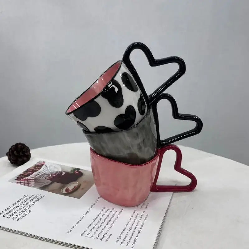 Glossy red decorbites heart shape ceramic coffee mugs with stacked black pink and gray heart shape ceramic handles