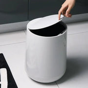 Glossy white cylindrical waste bin with hinged lid for garbage classification in decorbites kitchen bathroom