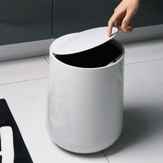 Glossy white cylindrical waste bin with hinged lid for garbage classification in decorbites kitchen bathroom