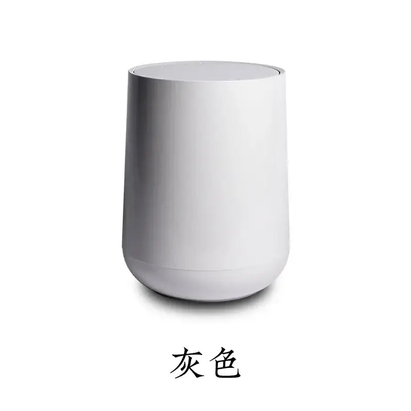 A sleek gray cylindrical air purifier with matte finish and rounded edges for decorbites kitchen bathroom use