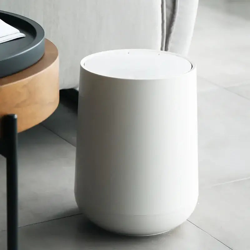 Glossy white cylindrical waste bin with smooth minimalist design for garbage classification in decorbites kitchen bathroom