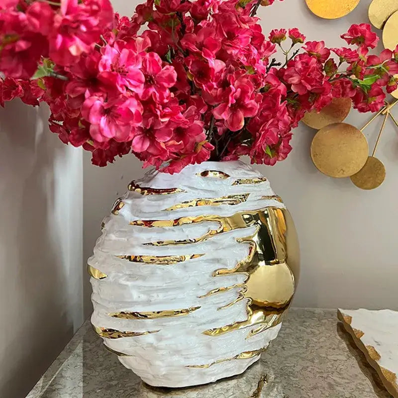 Glossy white and gold fringe geometry ceramic vase with textured wavy design for living room decor by decorbites