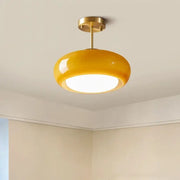 Glossy yellow glass ball led pendant light with brass metal fixture ideal for kitchen or dining room pendant lights