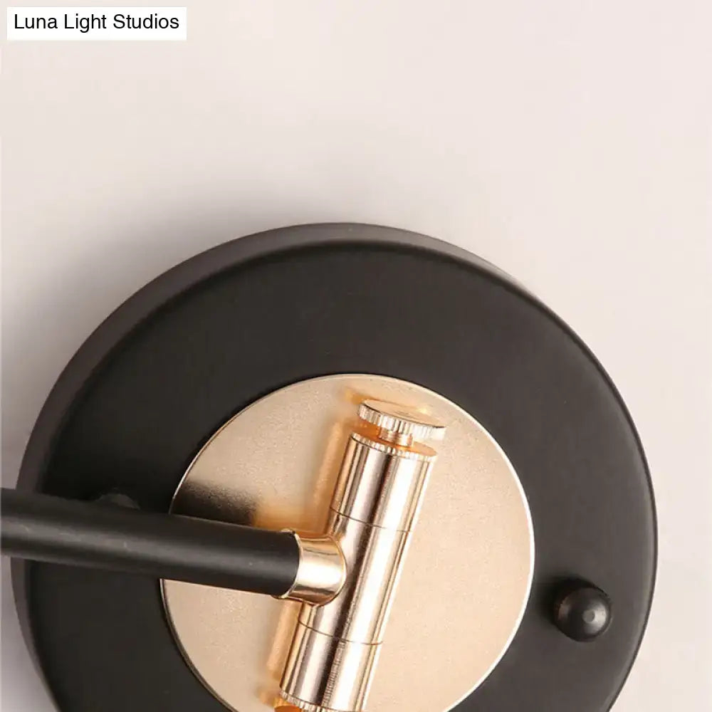 Black and brass metal cone wall dual-arm swing arm sconce with modern design for bedroom lighting