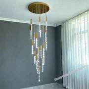 Gold and crystal led chandelier with gold-toned circular fixture and brass accented pendant lights for living room decorbites crystal led