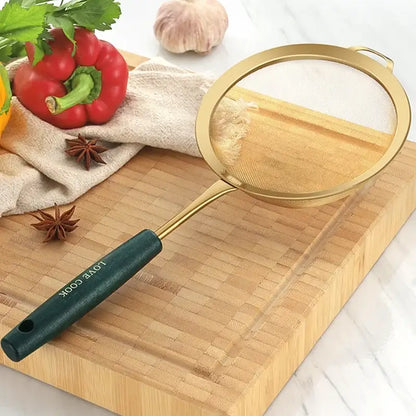 Gold and dark green metal kitchen colander juice strainer with love cook engraving on wooden cutting board decorbites kitchen colander