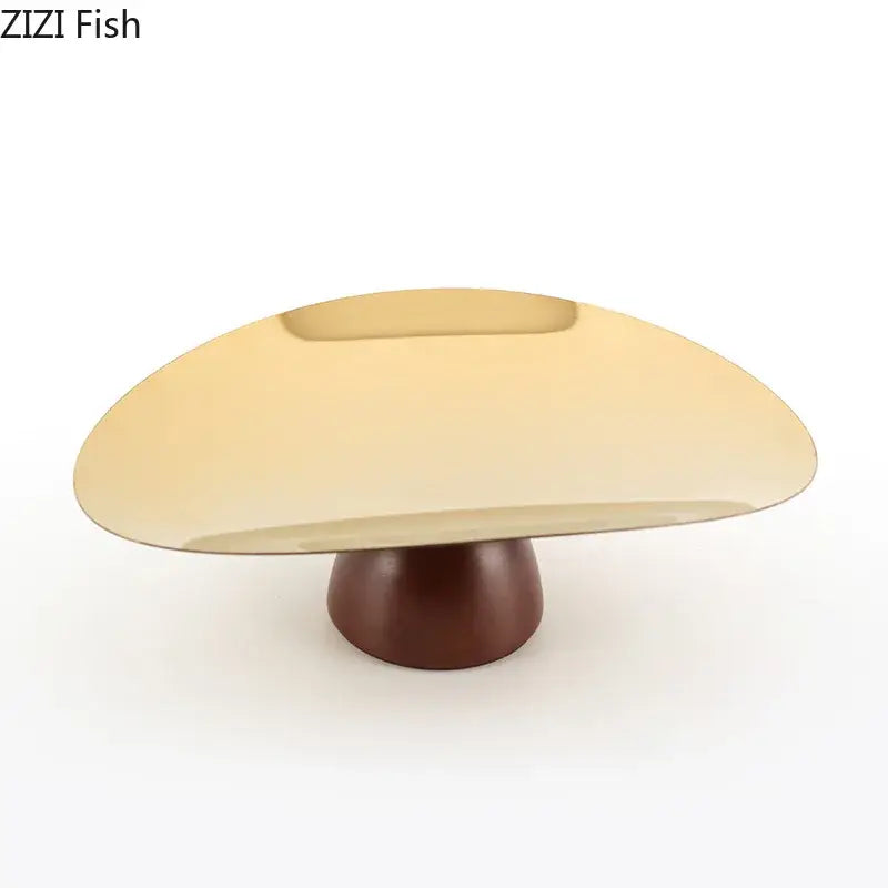 Gold and dark wood cake stand fruit bowl tray set with a sleek curved design and polished metallic top