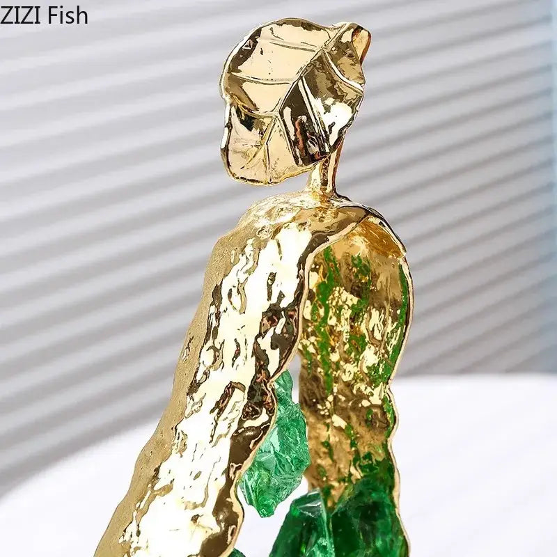 Golden leaf-shaped apple pear alloy ornament with textured metallic surface and green crystal accents for living room decor