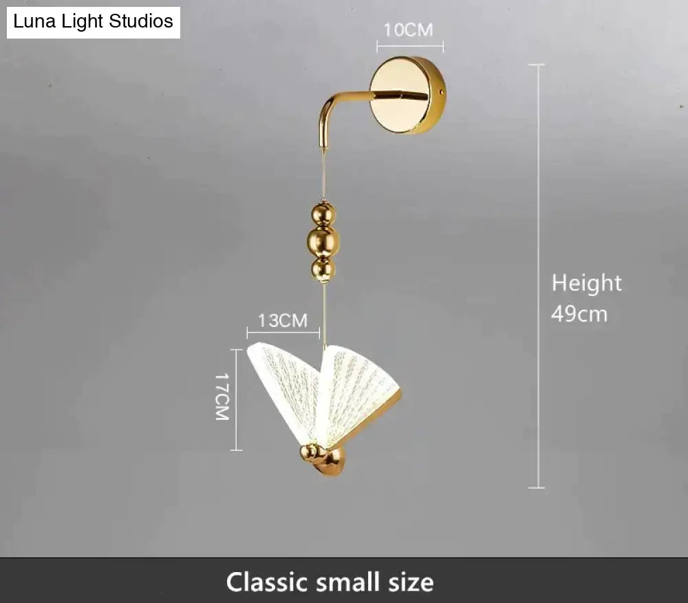 Gold finished nordic butterfly led wall light with fan shaped translucent shade and decorative spherical beads for bedroom