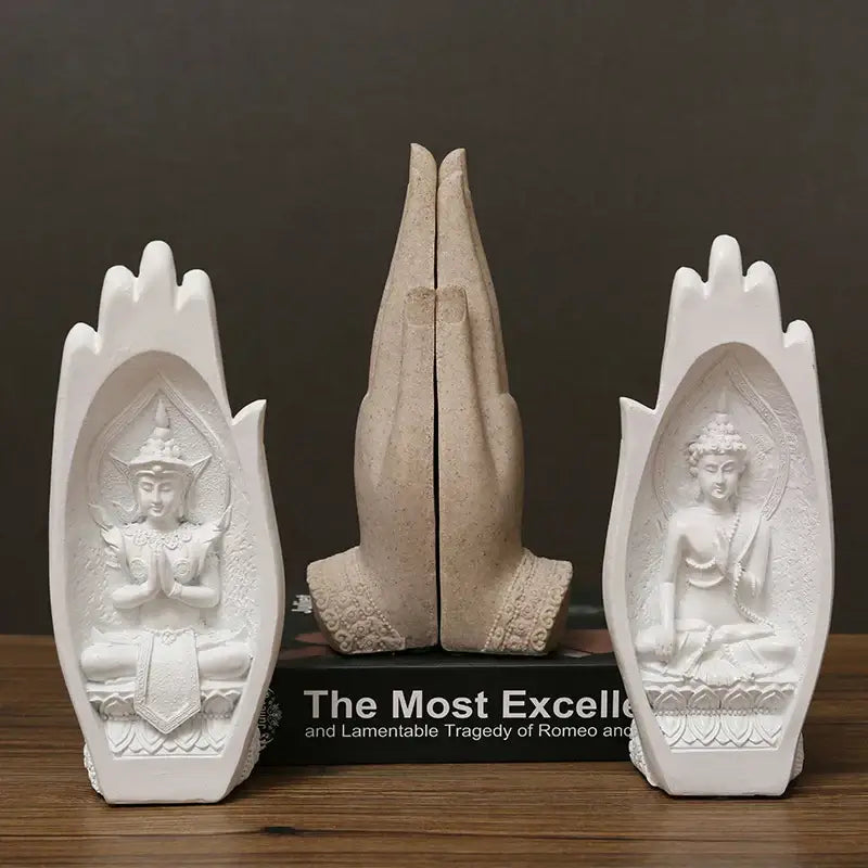 White resin buddha hands bookends with intricate monk figurine carvings for decorbites buddha hands living room decor