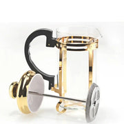 Gold and silver french press with black handle and silver-toned plunger for stylish kitchen teaware decorbites drip kettle accessory
