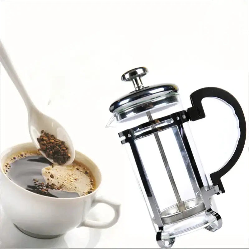 Clear glass french press with black handle and silver metal components ideal for decorbites drip kettle use