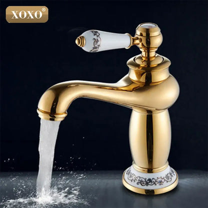 Gold and white ceramic deck mounted basin faucet with floral patterns and xoxo logo by decorbites bathroom basin