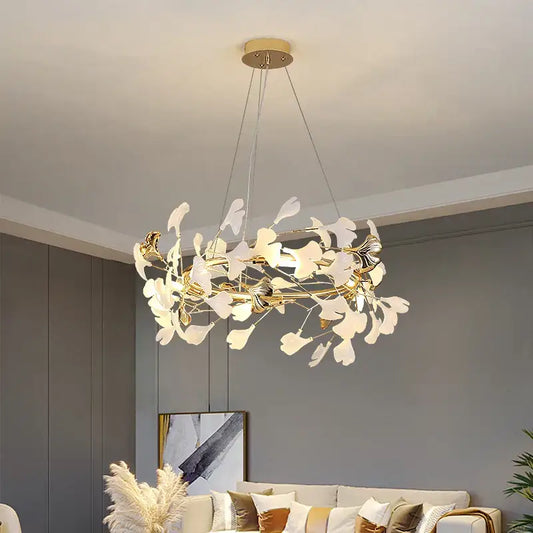 Gold and white ginkgo ceramic chandelier with gold-toned frame and white leaf-shaped glass for dining room décorbites ginkgo ceramic