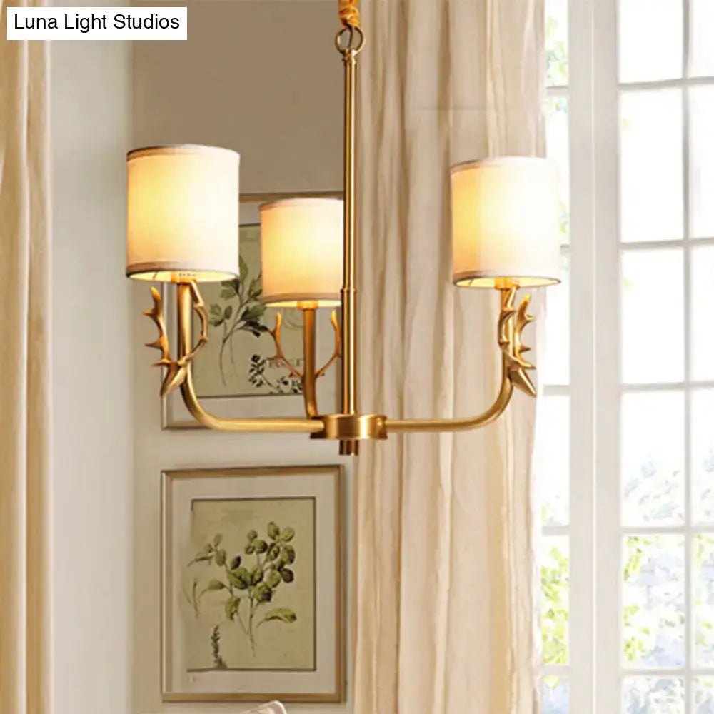 Gold antler fabric shade cylindrical chandelier with three cream fabric shades and metal arms for living room lighting compatible with led incandescent fluorescent bulbs