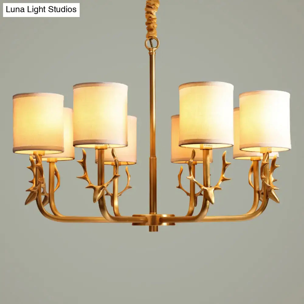 Gold-toned antler deco chandelier with cream fabric shade cylindrical lights suitable for led incandescent fluorescent bulbs