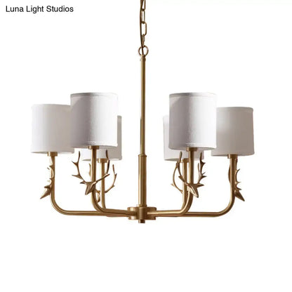 Gold antler fabric shade cylindrical chandelier with gold-toned arms and white fabric shade for living room lighting