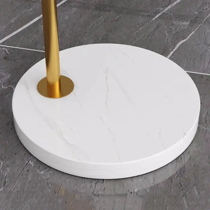 White marble-effect circular base with gold-toned metal pole of decorbites designer marble floor arched floor lamp