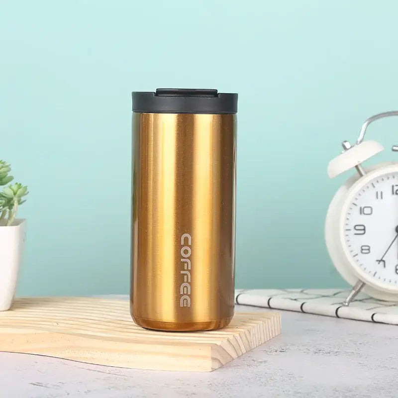 Gold and black decorbites insulated espresso cup made of stainless steel with coffee engraving for thermal travel use