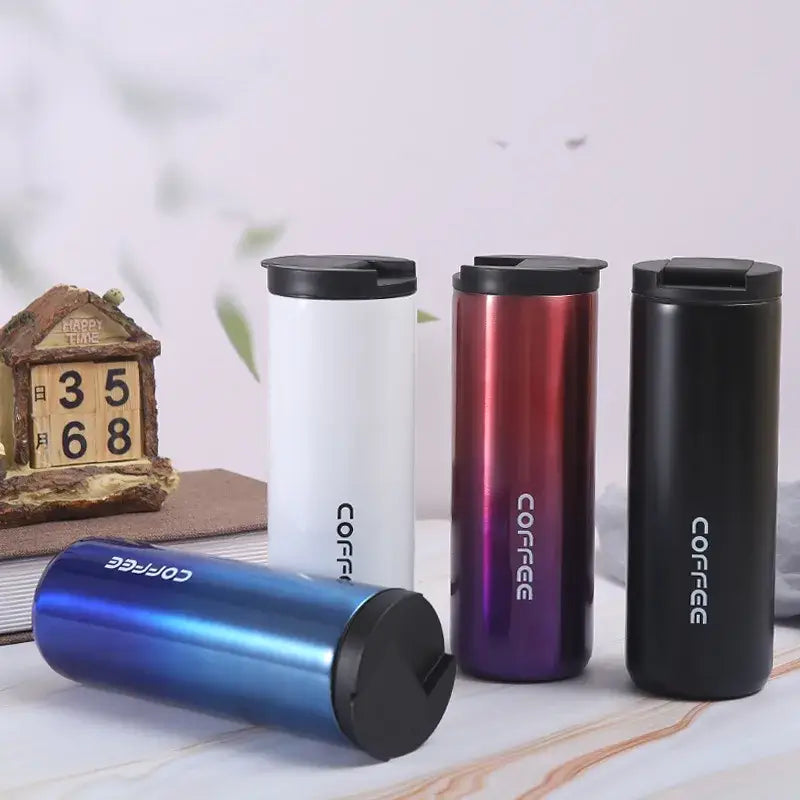Set of four decorbites insulated espresso travel mugs in white, gradient, black, and metallic blue with black lids