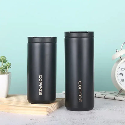 Two sleek black stainless steel decorbites insulated espresso travel mugs with silver coffee lettering for kitchen use