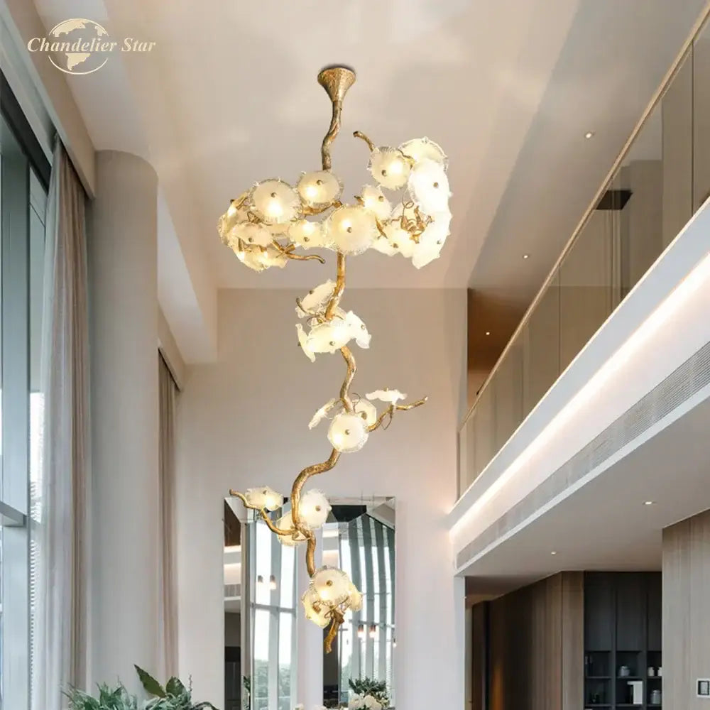 Gold branch glass chandelier led featuring translucent white flower-like glass shades for elegant dining room decorbites branch glass design