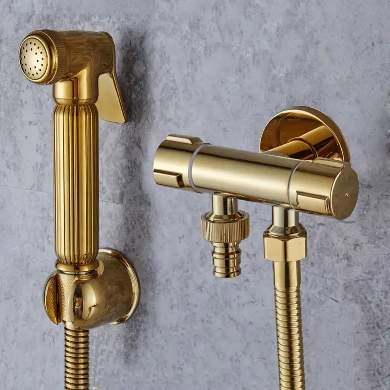 Gold brass handheld bidet faucet bathroom sprayer set with vertical ridged showerhead and wall-mounted valve decorbites bidet faucet