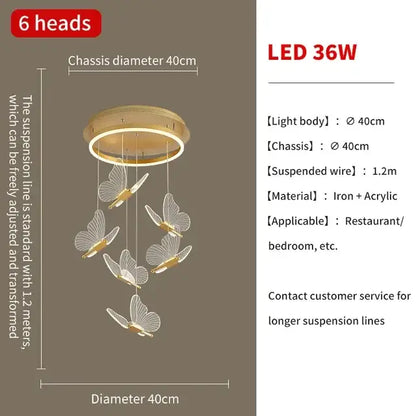 Gold-toned decorbites butterfly chandelier with six translucent acrylic wings hanging from iron and acrylic base