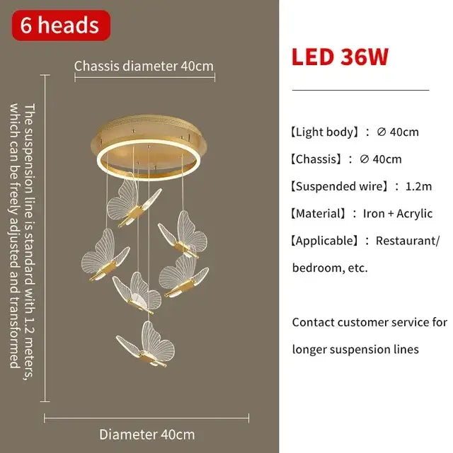 Gold-toned decorbites butterfly chandelier with six translucent acrylic wings hanging from iron and acrylic base