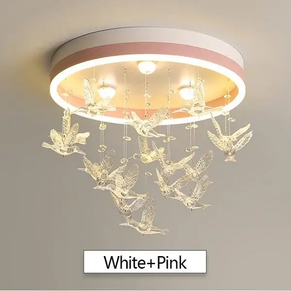 A modern white and pink ceiling chandelier featuring clear crystal bird ornaments by decorbites crystal led for kids bedroom