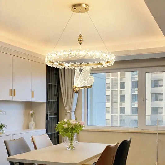 Gold butterfly crystal led chandelier with circular frame and clear crystal droplets for elegant decorbites crystal led decor