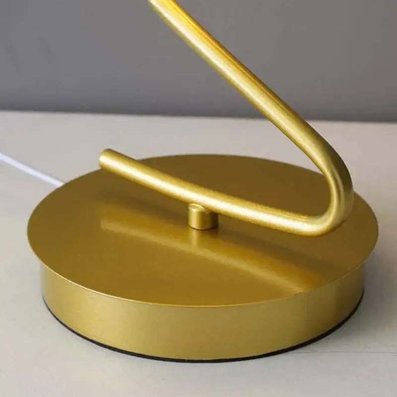 Gold butterfly led table lamp with gold metal curved design and circular base ideal for bedroom decorbites butterfly led accent light